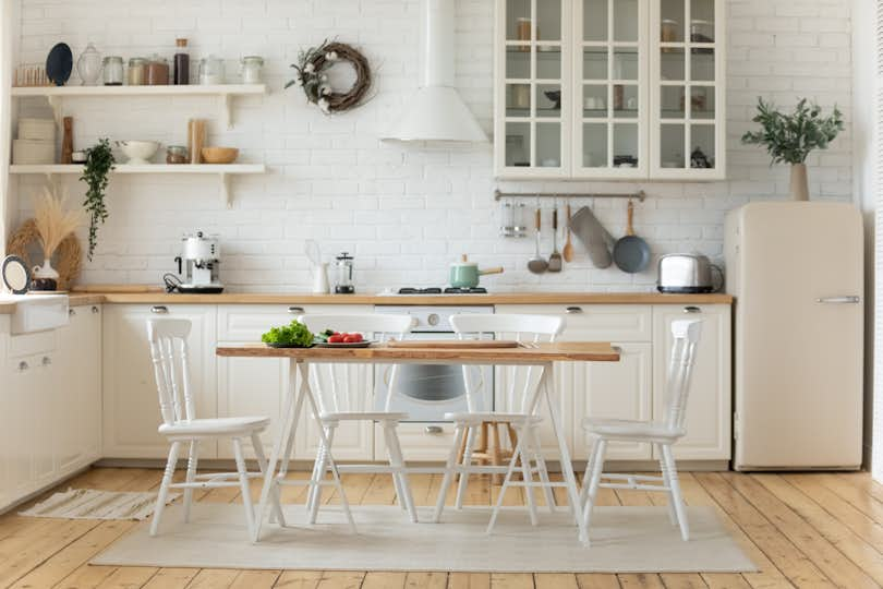 a beautifully photographed Airbnb unit featuring a retro-styled farmhouse kitchen