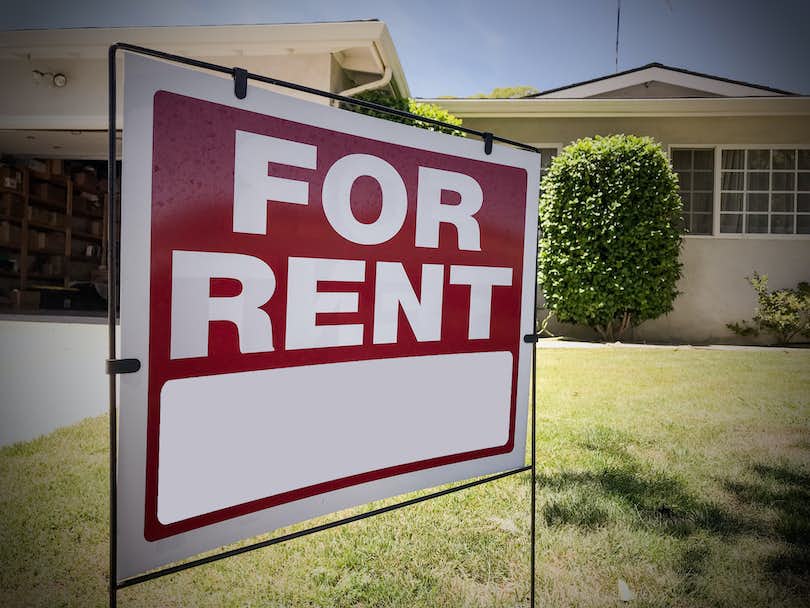 For-Rent sign in front of house