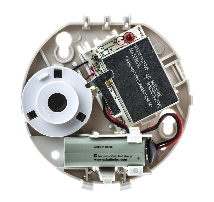 Ionization smoke detector with its cover off