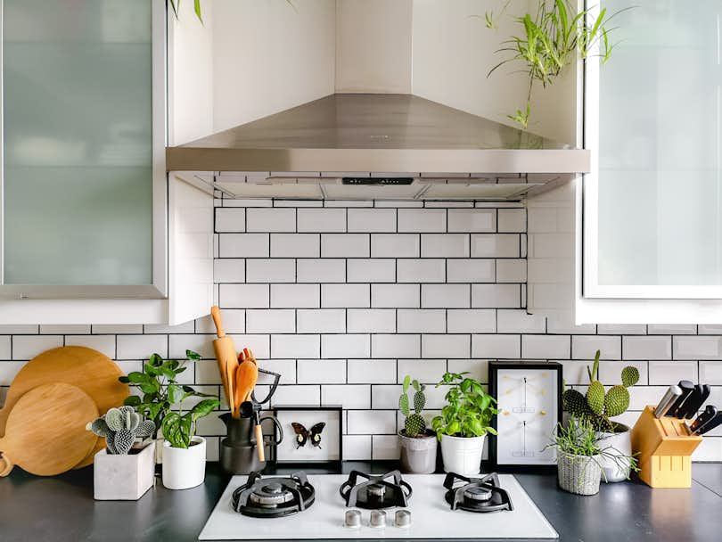 Black and white subway tiled kitchen