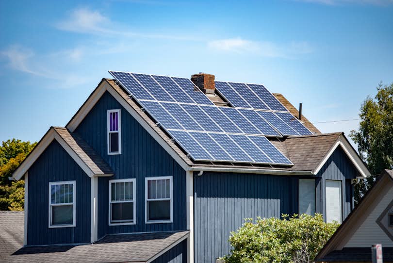 solar panels installed on the roof of a single-family home